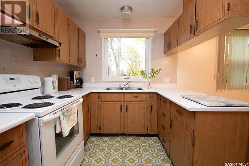 1642 104Th Street, North Battleford, SK - Indoor Photo Showing Kitchen With Double Sink