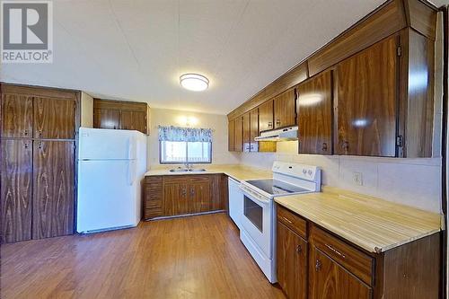 100 5 Street Sw, Slave Lake, AB - Indoor Photo Showing Kitchen