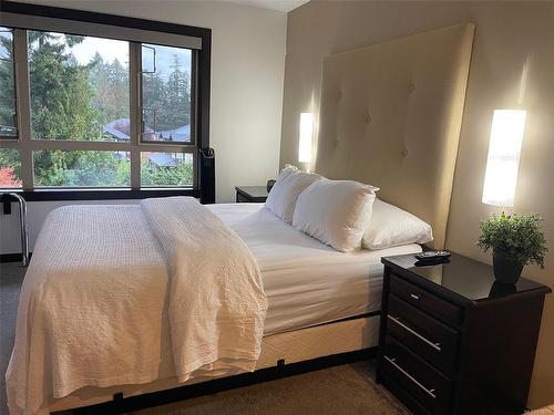 234-1175 Resort Dr, Parksville, BC - Indoor Photo Showing Bedroom