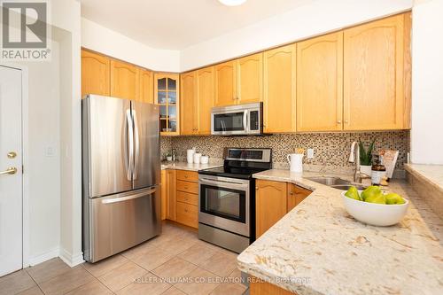 211 - 3531 Lake Shore Boulevard W, Toronto, ON - Indoor Photo Showing Kitchen With Stainless Steel Kitchen With Double Sink