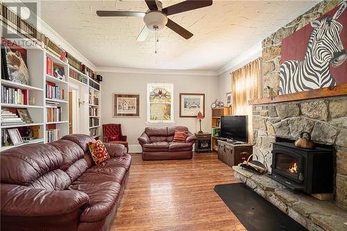 2296 South Lavant Road, Lanark Highlands, ON - Indoor Photo Showing Living Room With Fireplace