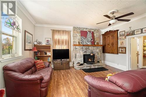 2296 South Lavant Road, Lanark Highlands, ON - Indoor Photo Showing Living Room With Fireplace