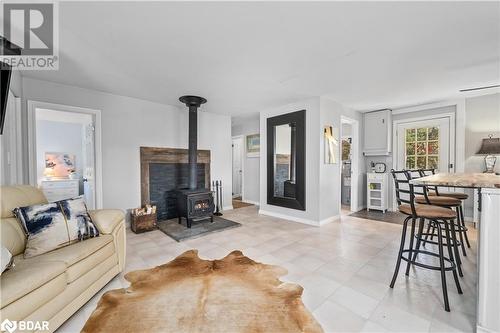 1019 Turner Way, Arden, ON - Indoor Photo Showing Living Room With Fireplace