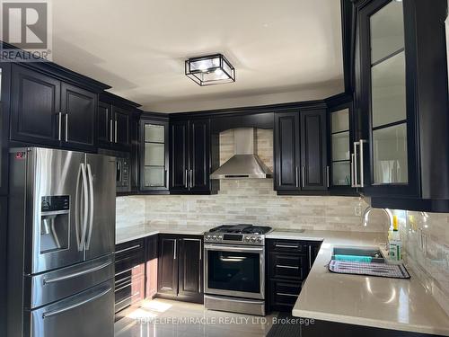 91 Earlsbridge Boulevard, Brampton, ON - Indoor Photo Showing Kitchen With Stainless Steel Kitchen With Double Sink With Upgraded Kitchen