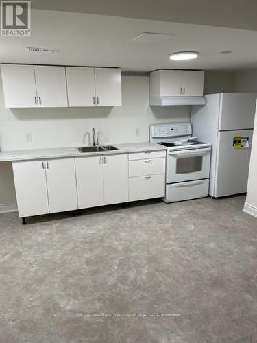 Lower - 63 Lockerbie Avenue, Toronto, ON - Indoor Photo Showing Kitchen With Double Sink