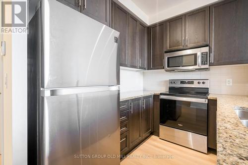 515 - 9245 Jane Street, Vaughan, ON - Indoor Photo Showing Kitchen With Double Sink