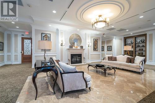 515 - 9245 Jane Street, Vaughan, ON - Indoor Photo Showing Living Room With Fireplace