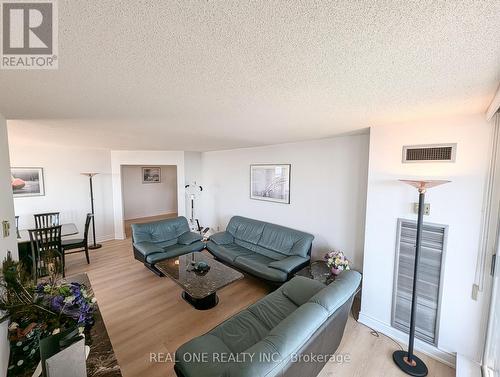 1103 - 175 Bamburgh Circle, Toronto, ON - Indoor Photo Showing Living Room