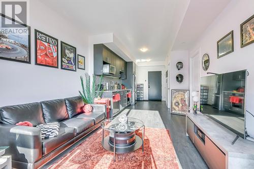 325 - 3220 William Coltson Ave Avenue E, Oakville, ON - Indoor Photo Showing Living Room