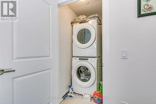 325 - 3220 William Coltson Ave Avenue E, Oakville, ON - Indoor Photo Showing Laundry Room