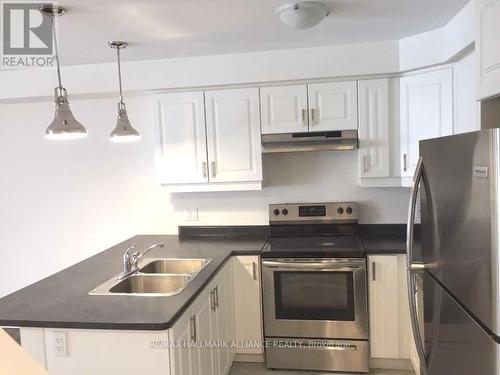 65 - 1000 Asleton Boulevard, Milton, ON - Indoor Photo Showing Kitchen With Double Sink