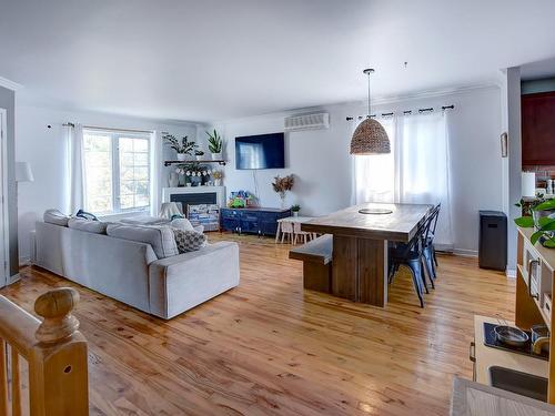 Vue d'ensemble - 66  - 66A Rue Des Tourterelles, Blainville, QC - Indoor Photo Showing Living Room With Fireplace