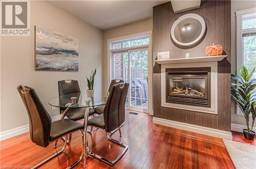 76 Woolwich Street Unit# 8, Kitchener, ON - Indoor Photo Showing Dining Room With Fireplace