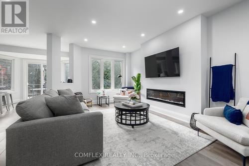 39 Blossomview Court, Whitby, ON - Indoor Photo Showing Living Room With Fireplace