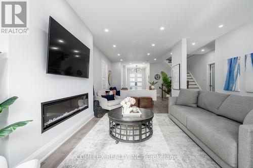 39 Blossomview Court, Whitby, ON - Indoor Photo Showing Living Room With Fireplace