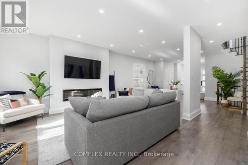 39 Blossomview Court, Whitby, ON - Indoor Photo Showing Living Room With Fireplace