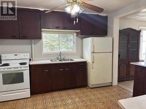 321 Maple Street N, Timmins, ON - Indoor Photo Showing Kitchen With Double Sink