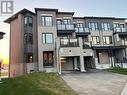 111 Tennant Circle, Vaughan, ON  - Outdoor With Balcony With Facade 