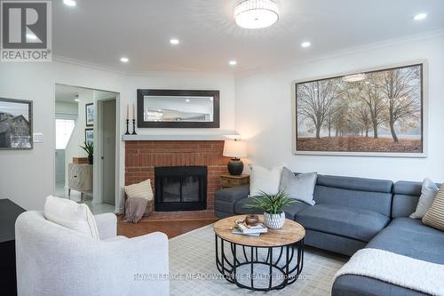 822 Laurier Avenue, Milton, ON - Indoor Photo Showing Living Room With Fireplace