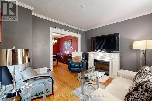 112 Fifth Street, Toronto, ON - Indoor Photo Showing Living Room With Fireplace