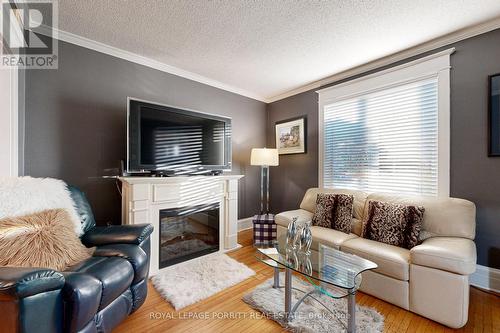 112 Fifth Street, Toronto, ON - Indoor Photo Showing Living Room With Fireplace