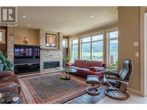 8883 Braeburn Drive, Coldstream, BC - Indoor Photo Showing Living Room With Fireplace