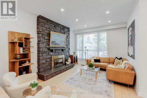 171 Coronation Drive, Toronto, ON - Indoor Photo Showing Living Room With Fireplace