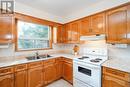 84 Wendake Road, Tiny, ON  - Indoor Photo Showing Kitchen With Double Sink 