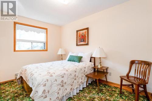 84 Wendake Road, Tiny, ON - Indoor Photo Showing Bedroom