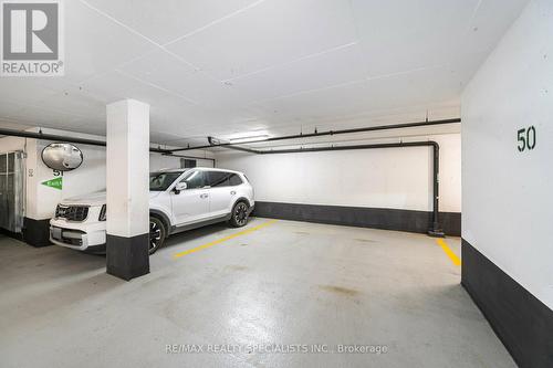 2415 - 35 Watergarden Drive, Mississauga, ON - Indoor Photo Showing Garage