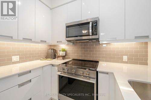 2415 - 35 Watergarden Drive, Mississauga, ON - Indoor Photo Showing Kitchen With Upgraded Kitchen