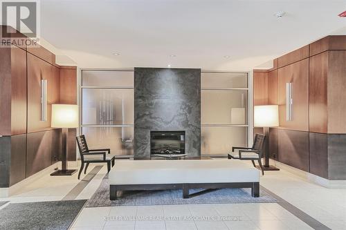 504 - 80 Port Street E, Mississauga, ON - Indoor With Fireplace