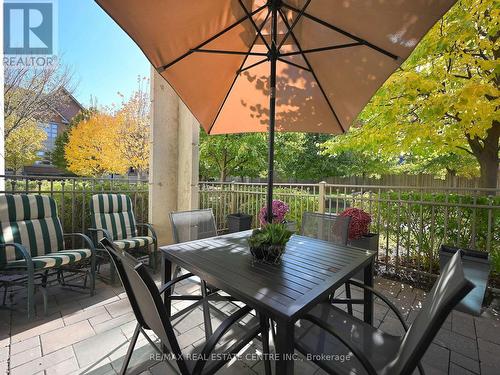 107 - 2480 Prince Michael Drive, Oakville, ON - Outdoor With Deck Patio Veranda With Exterior