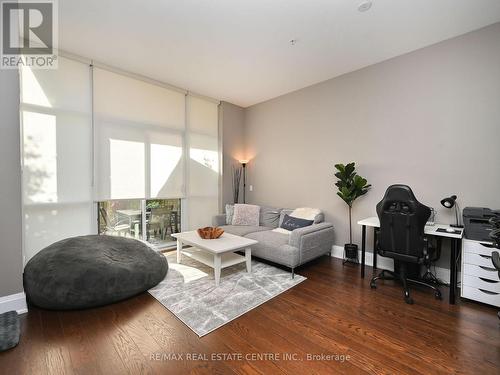 107 - 2480 Prince Michael Drive, Oakville, ON - Indoor Photo Showing Living Room