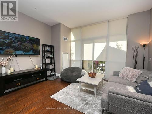 107 - 2480 Prince Michael Drive, Oakville, ON - Indoor Photo Showing Living Room