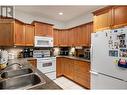 1961 Durnin Road Unit# 210, Kelowna, BC  - Indoor Photo Showing Kitchen With Double Sink 