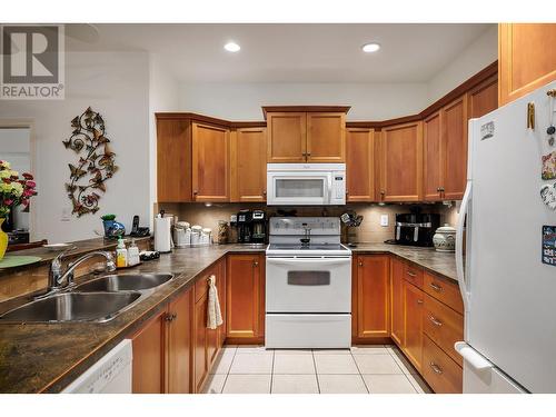 1961 Durnin Road Unit# 210, Kelowna, BC - Indoor Photo Showing Kitchen With Double Sink