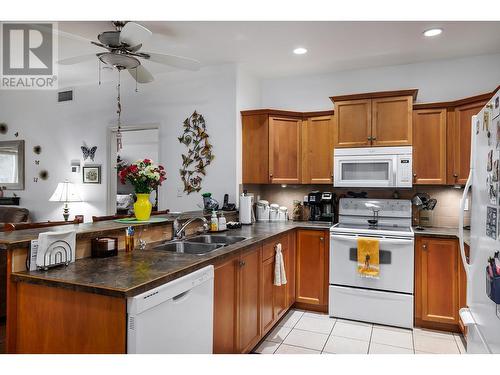 1961 Durnin Road Unit# 210, Kelowna, BC - Indoor Photo Showing Kitchen With Double Sink