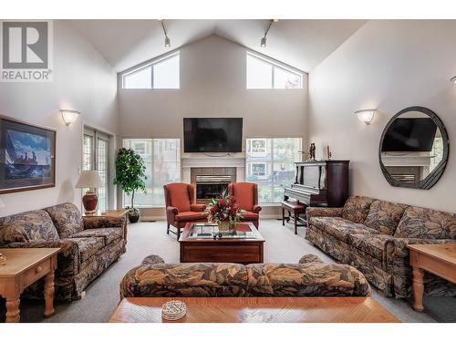 1961 Durnin Road Unit# 210, Kelowna, BC - Indoor Photo Showing Living Room With Fireplace