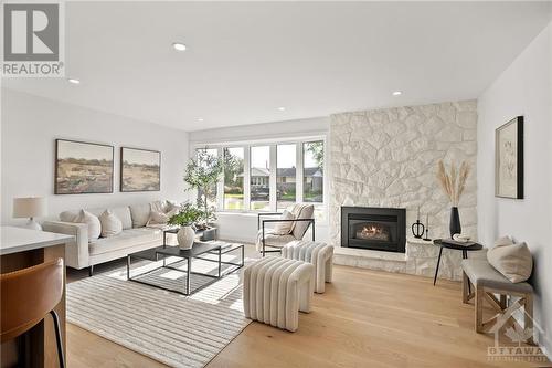 20 Ilkley Crescent, Ottawa, ON - Indoor Photo Showing Living Room With Fireplace