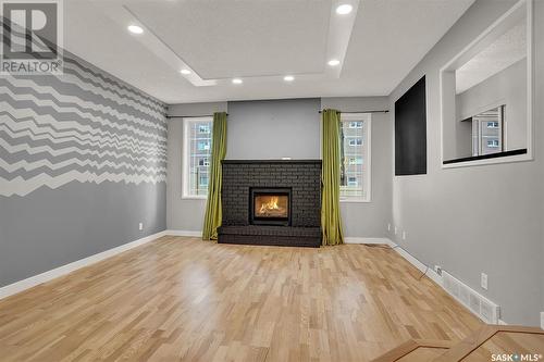 2233 Mcintyre Street, Regina, SK - Indoor Photo Showing Living Room With Fireplace