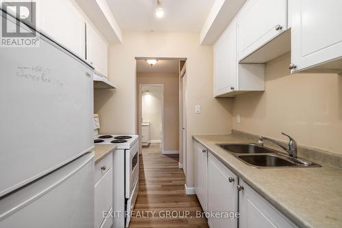 401 - 25 College Street E, Belleville, ON - Indoor Photo Showing Kitchen With Double Sink