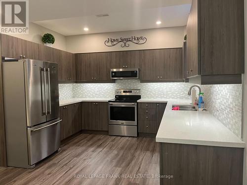 B - 16044 Simcoe Street, Scugog (Port Perry), ON - Indoor Photo Showing Kitchen With Double Sink With Upgraded Kitchen