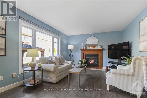 388 Haileybury Crescent, Ottawa, ON - Indoor Photo Showing Living Room With Fireplace