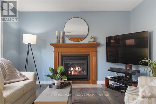 388 Haileybury Crescent, Ottawa, ON - Indoor Photo Showing Living Room With Fireplace