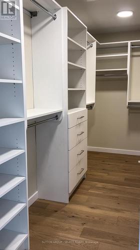 Primary suite walk in closet - 88 Optimist Drive, Southwold (Talbotville), ON - Indoor With Storage