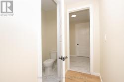 Half bath leading into mudroom - 