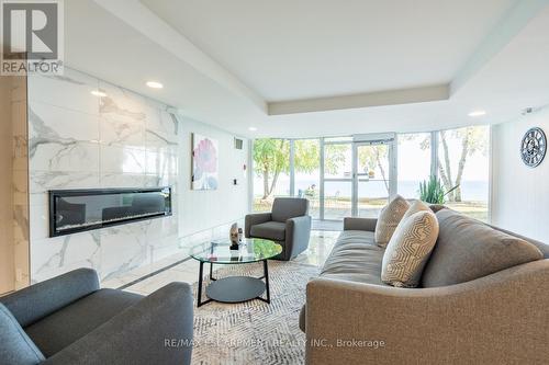 105 - 5280 Lakeshore Road, Burlington, ON - Indoor Photo Showing Living Room With Fireplace