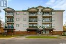 202 205 Mcintyre Street N, Regina, SK  - Outdoor With Balcony With Facade 