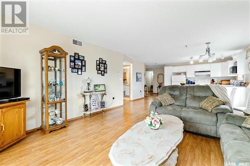 202 205 Mcintyre Street N, Regina, SK - Indoor Photo Showing Living Room